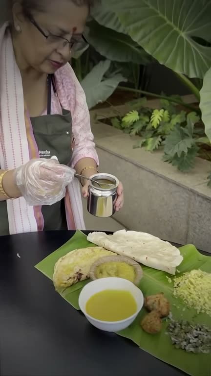 A Henchu catering spread on a banana leaf